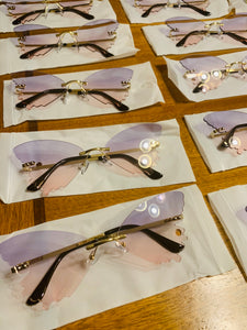 Gafas de sol sin montura de mariposa